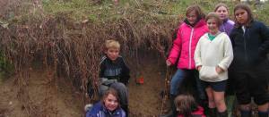 AALC students by river bank