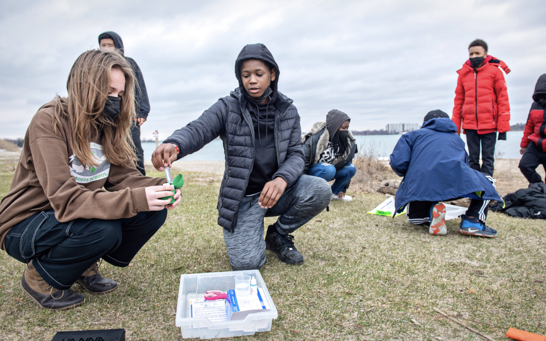 A group of students practice water quality testing at Belle Isle in Detroit in 2022. Credit: Leisa Thompson